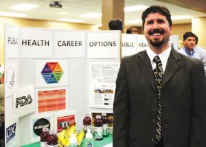 Sarah Hlusko photo: Professor of Public Health David Dausey, Ph.D., at the Major and Minors Fair on Wednesday, Oct. 19.